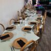 Serpentine Dining Table - Imperial Gold And Crystal Chandelier Glass Top